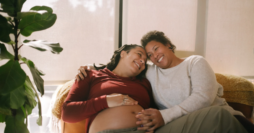 Pregnant woman and friend