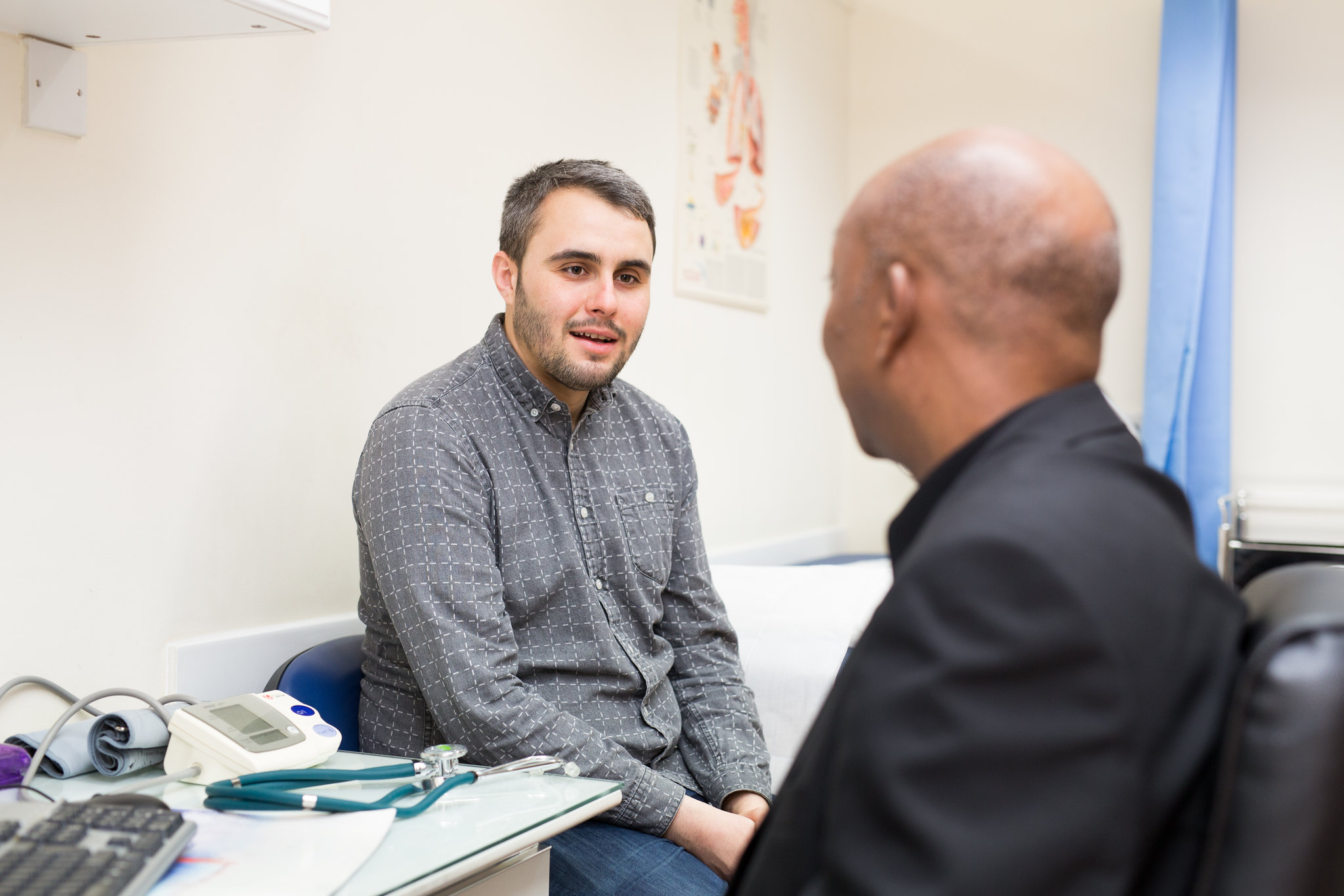 A man talking with a doctor