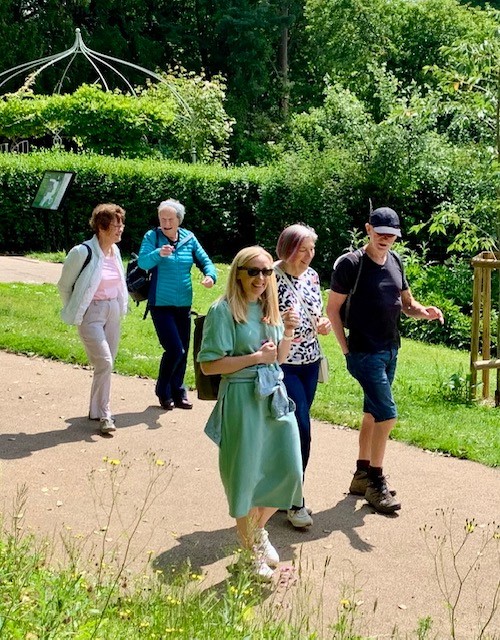 Staff and volunteers walking in the sunshine