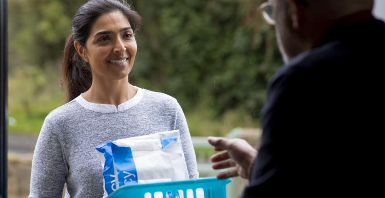 picture of woman with bag for prescriptions 