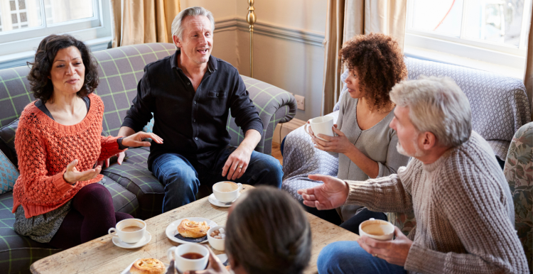 People chatting round a table