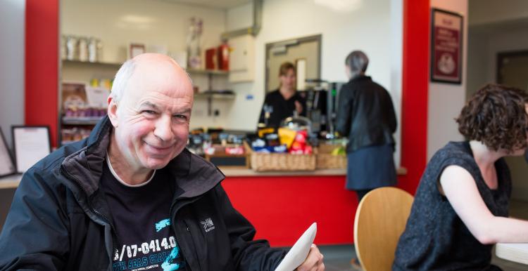 a man in a cafe