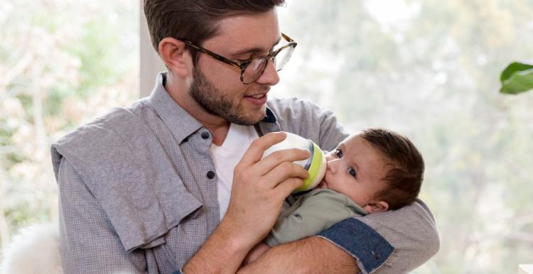 Man holding baby