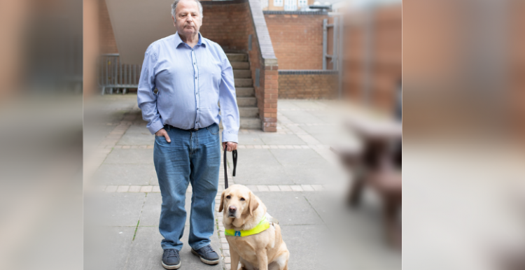 A man with a guide dog