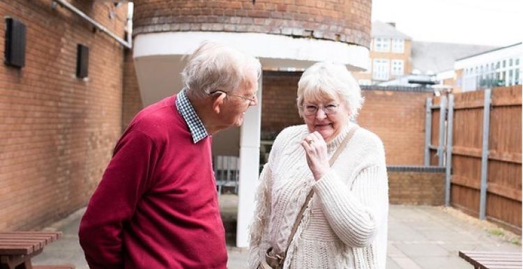 Man and woman chatting Man and woman chatting