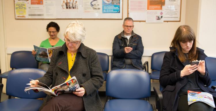 Patients sitting in waiting room