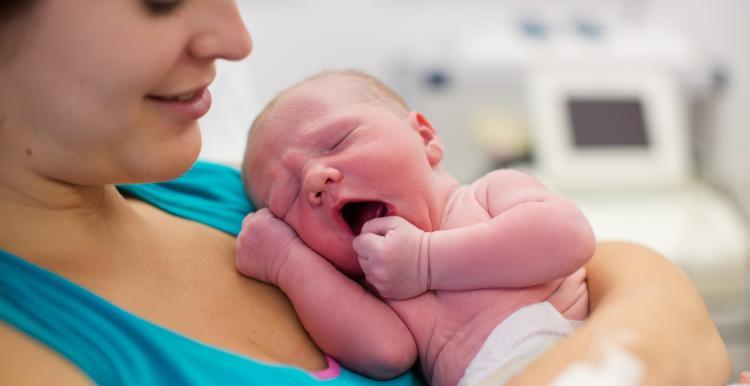 woman holding baby