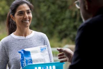 picture of woman with bag for prescriptions 