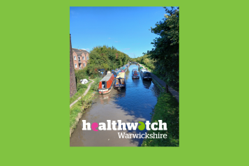 Canal boats, blue sky and trees