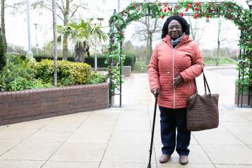 woman with a walking stick