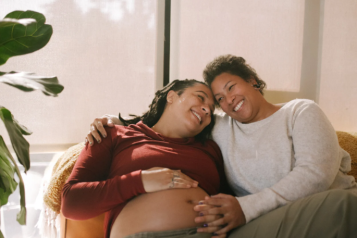 Pregnant woman and friend