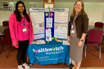 Staff Caroline and Vina with our information stand