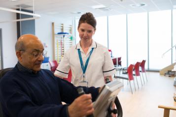 male patient with physiotherapist