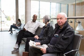 people in a hospital waiting area 