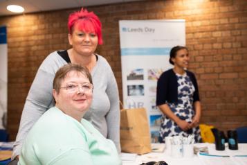 2 ladies attending a community event