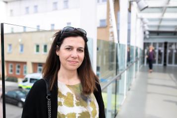 A woman outside a hospital