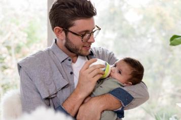 Man holding baby