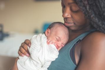 Mother holding a baby