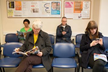 Patients sitting in waiting room