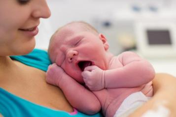 woman holding baby