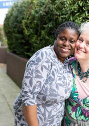 two ladies together laughing