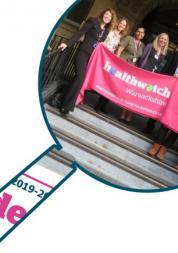 Staff team with Healthwatch Warwickshire banner