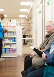 People waiting in a pharmacy
